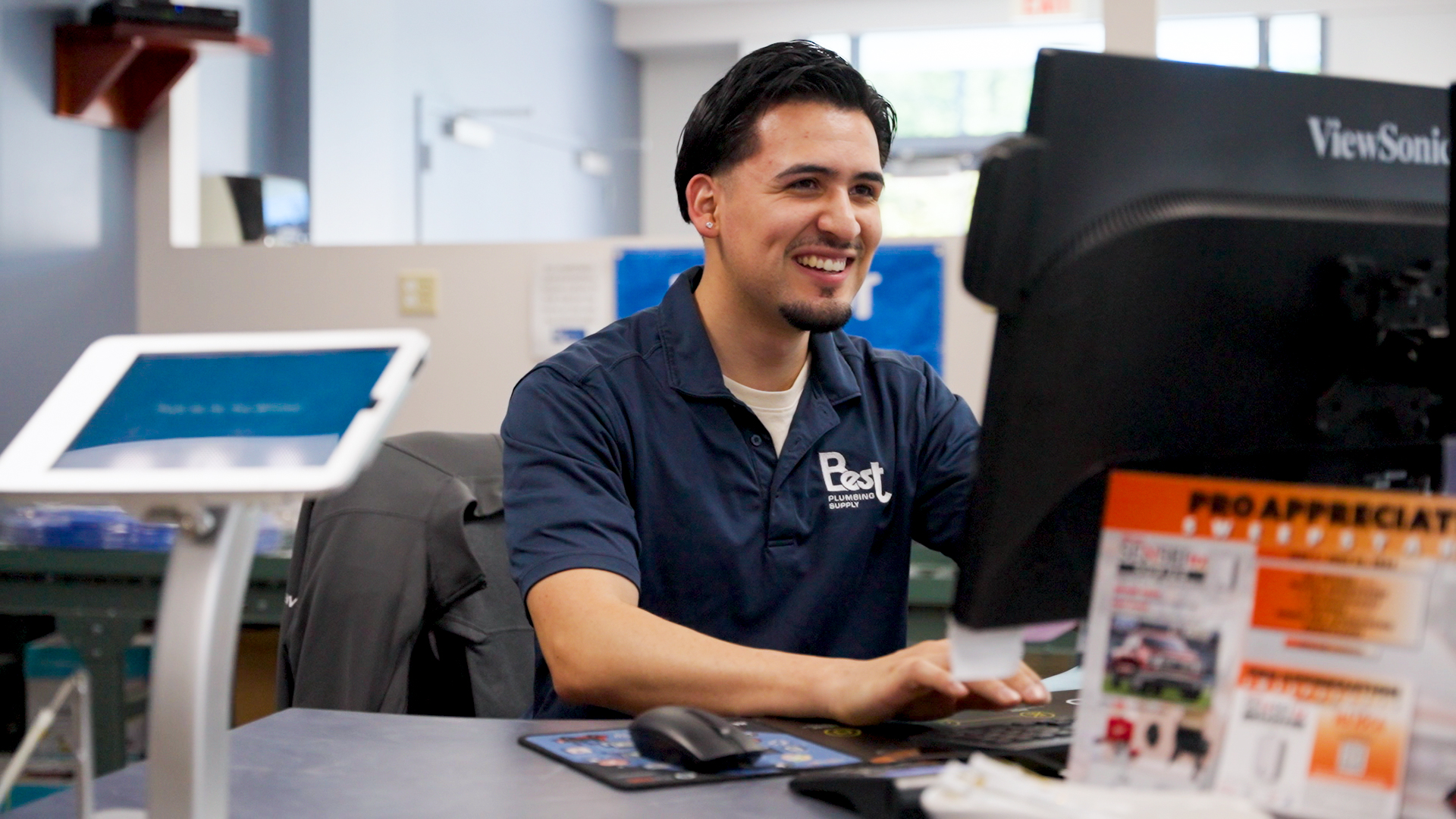 Image of a worker behind the trade counter